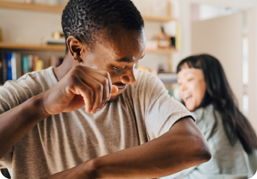 Interracial couple dancing. Inclusion focus.